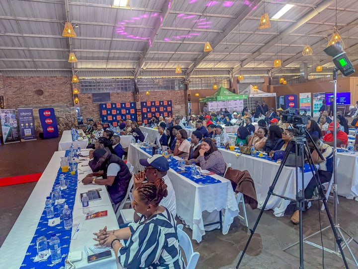 Guests seated at tables inside the Zimbabwe Diaspora Week 2026 venue.